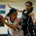 Green Hills junior Elisia Ceballo-Countryman is guarded by Arbor Prep Zakiya Wells on Monday, Feb. 11. Daniel Brenner I AnnArbor.com